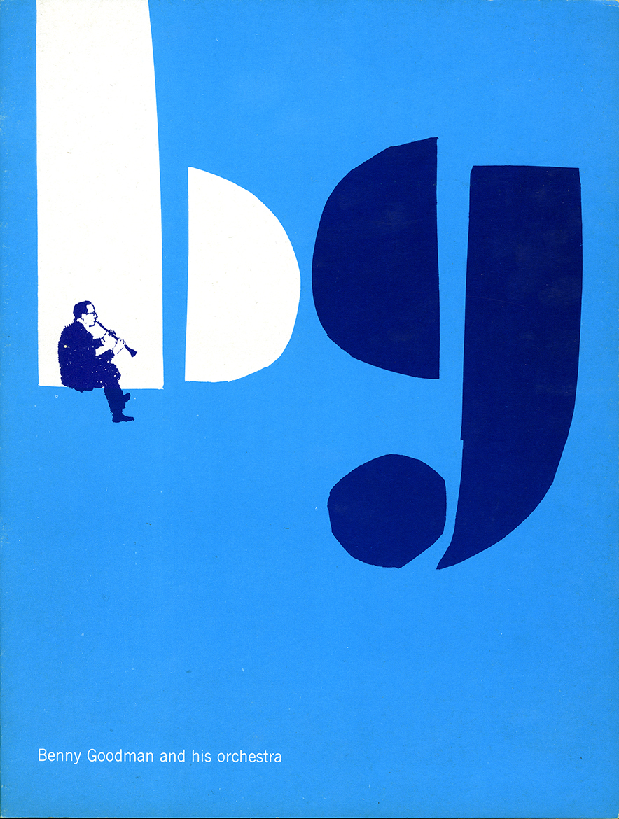 man playing trumpet sitting on the letter B